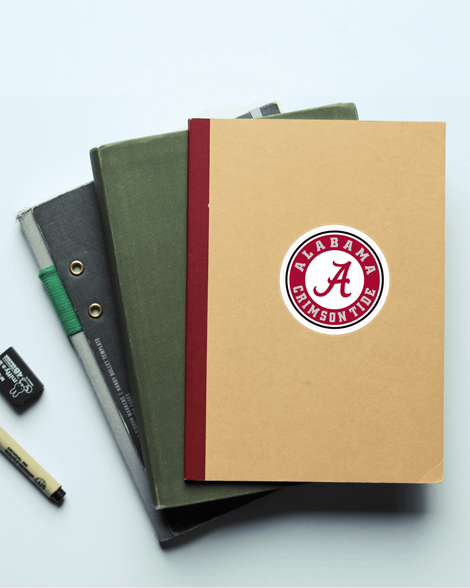 Alabama Crimson Tide NCAA Football Vinyl Decal on notebook